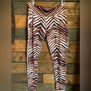 Zebra style orange and black team leggingsXL
